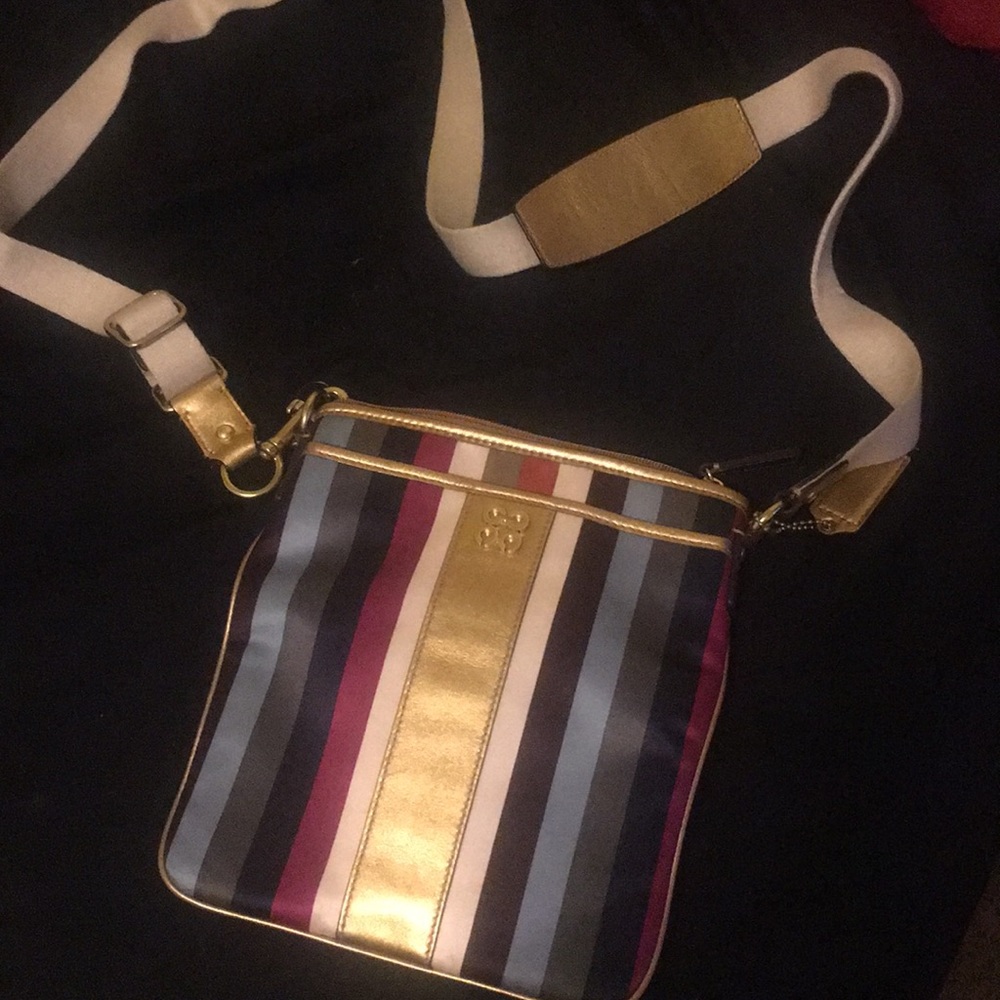 Multi colored crossed body coach bag